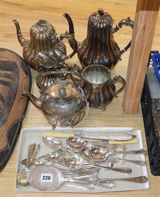 A four piece silver plated tea set, a teapot (without stand) and a quantity of mixed plated cutlery